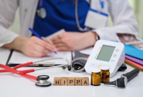 healthcare-professional-is-activelymonitoring-patient-thoroughly-while-adhering-hipaa-compliance_151013-64983
